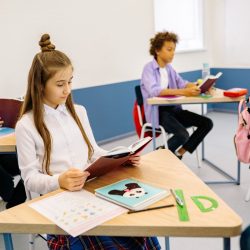 Primary 6 pupil studying for the SEAG Transfer Test during the summer holidays.