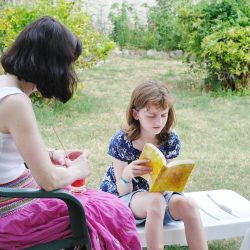 Primary school children learning through everyday activities during the summer holidays.